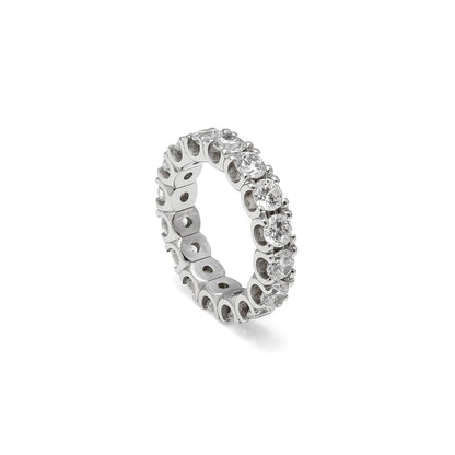 Alianza de contorno luminoso y garras. Las garras de tono plateado perfilan la sucesión de piedras incoloras.