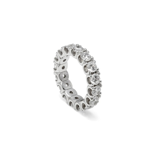 Alianza de contorno luminoso y garras. Las garras de tono plateado perfilan la sucesión de piedras incoloras.