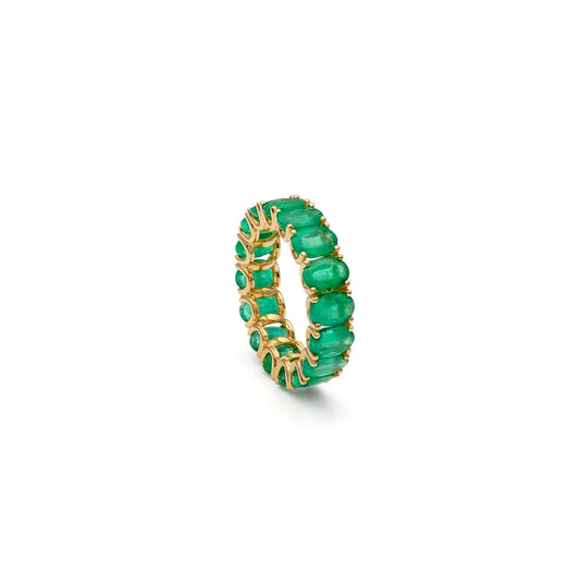 Alianza de esmeraldas y contorno verde. Las esmeraldas se repiten alrededor del tramo visible del aro.