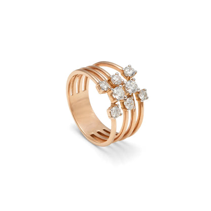 Anillo de bandas doradas y centros de luz. Las líneas paralelas dejan espacios visibles entre sí.