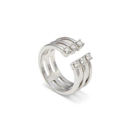 Anillo abierto de bandas lisas. Los motivos luminosos rematan ambos lados de la abertura frontal.