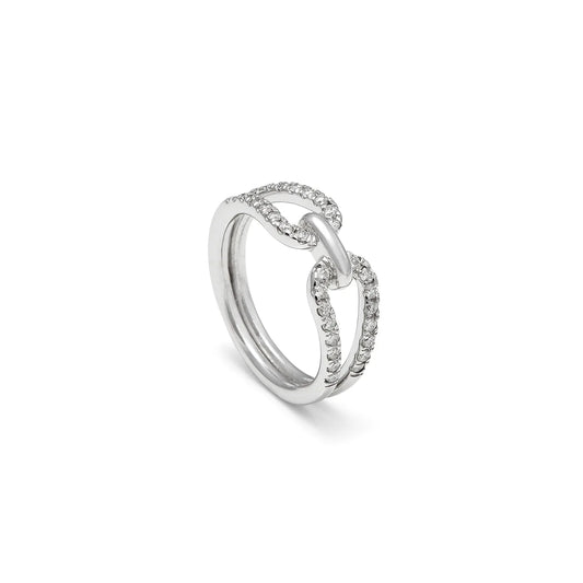 Anillo de lazo y línea luminosa. El motivo central conecta las bandas en la zona del encuentro.