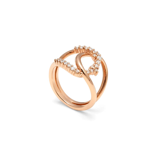 Anillo de curva en lágrima. El aro se desdobla para dibujar el motivo abierto del frente.