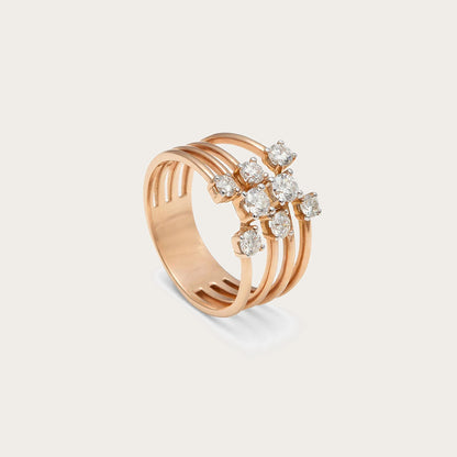 Anillo de bandas doradas y centros de luz. Las líneas paralelas dejan espacios visibles entre sí.