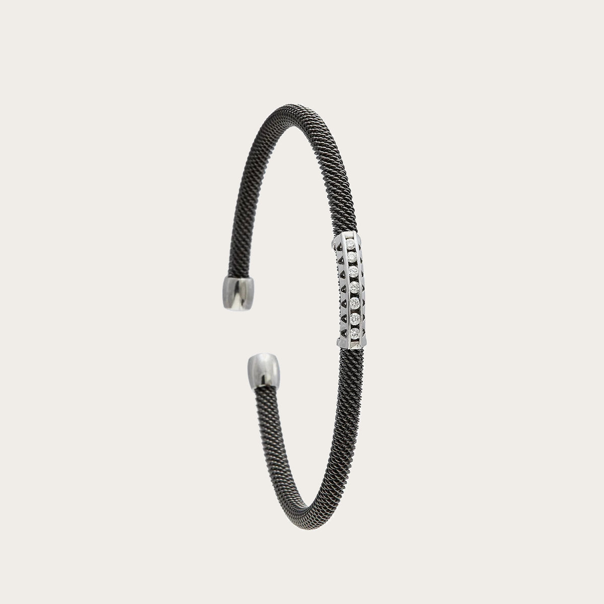 Pulsera de acero y oro con hilera de brillantes. Los pequeños centros se presentan en monturas diferenciadas.