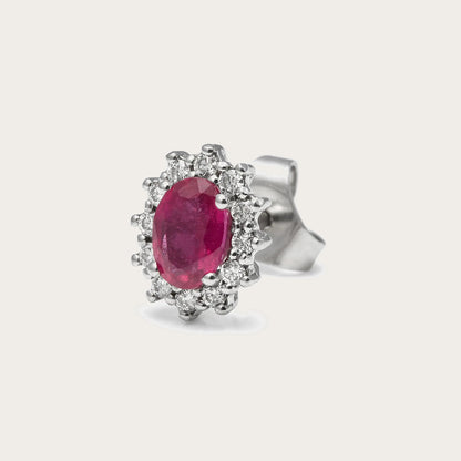 Pendientes de centro rosado y halo. Las piedras incoloras siguen la silueta del motivo central.