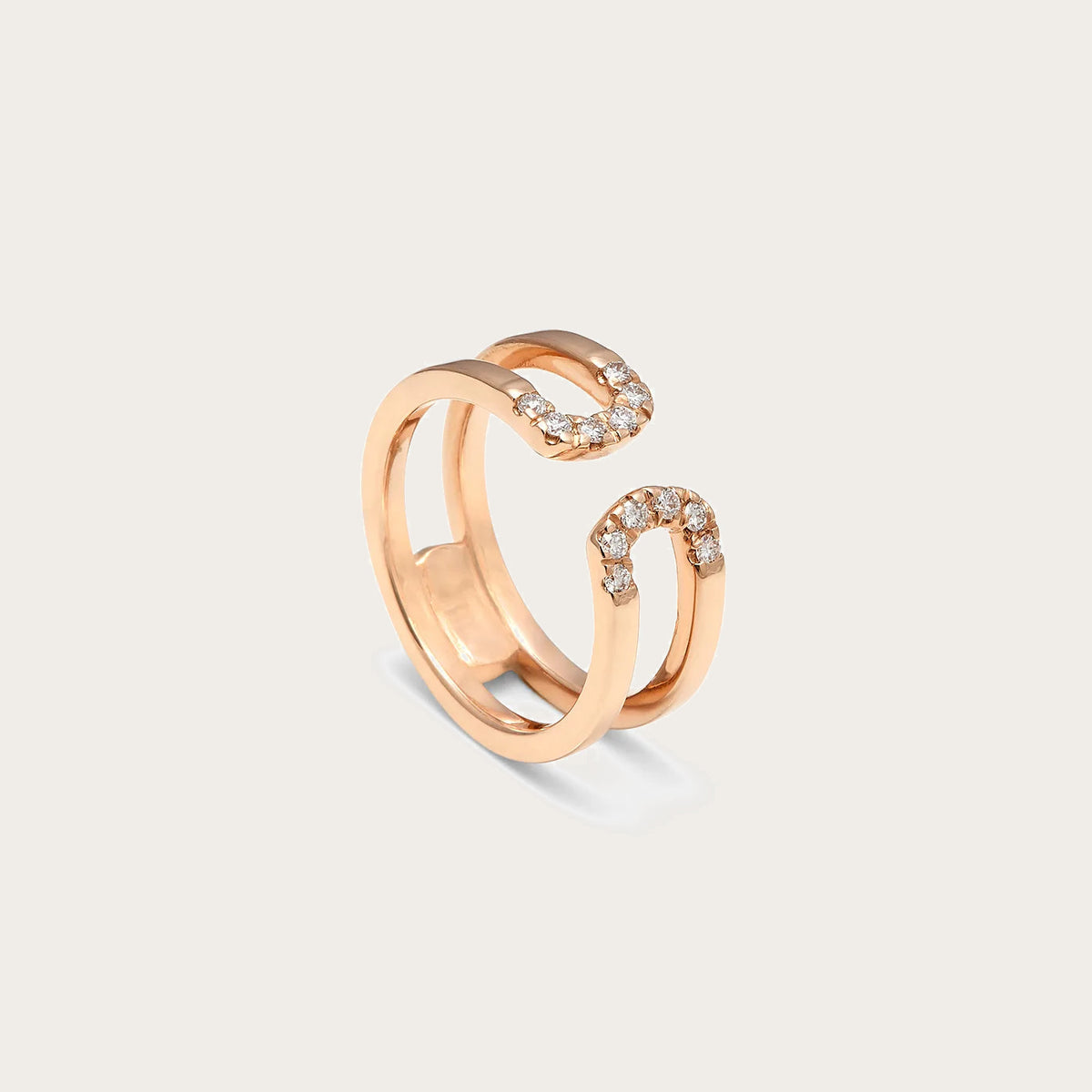 Anillo abierto de curvas luminosas. El aro se desdobla para dibujar los extremos curvos.