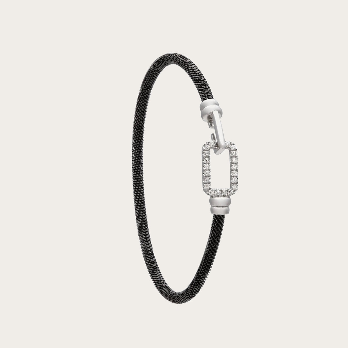 Pulsera de acero y oro de rectángulo luminoso. Los extremos redondeados suavizan el contorno del motivo.