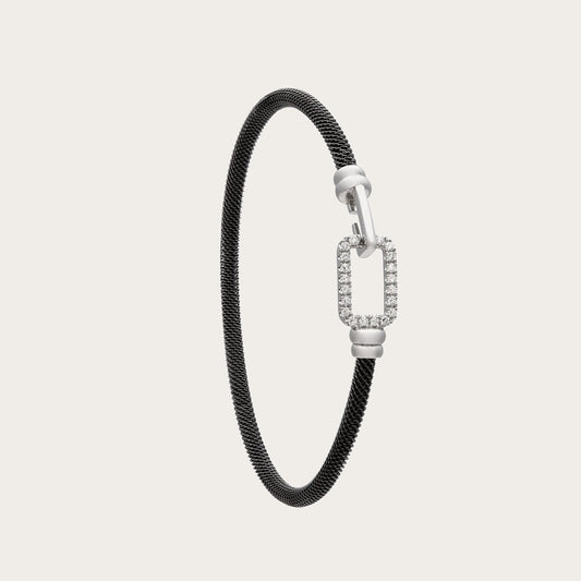 Pulsera de acero y oro de rectángulo luminoso. Los extremos redondeados suavizan el contorno del motivo.