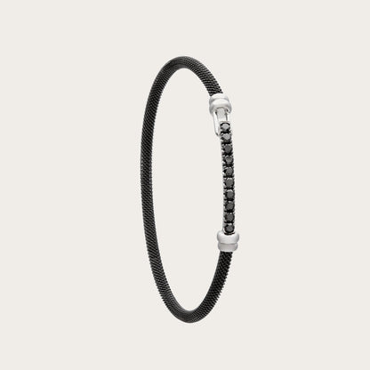 Pulsera de acero de brillantes negros. Los pequeños centros se alinean en una barra frontal.