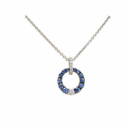 Colgante circular de centros azules e incoloros con cadena de tono plateado, referencia V-2549/CL.