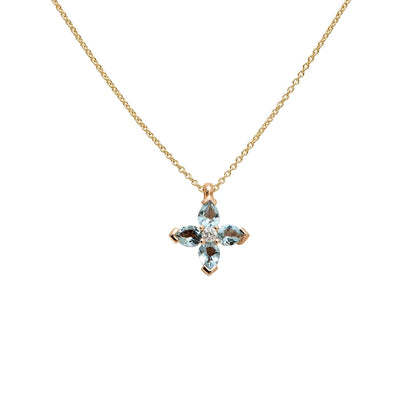 Colgante de cruz con centros de color. Las monturas de tono dorado delimitan los motivos de cada brazo.