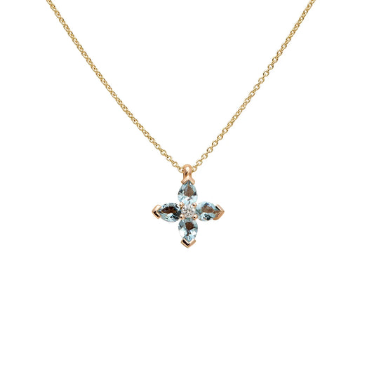 Colgante de cruz con centros de color. Las monturas de tono dorado delimitan los motivos de cada brazo.
