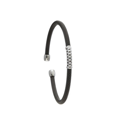 Pulsera de acero y oro con hilera de brillantes. Los pequeños centros se presentan en monturas diferenciadas.