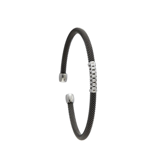 Pulsera de acero y oro con hilera de brillantes. Los pequeños centros se presentan en monturas diferenciadas.