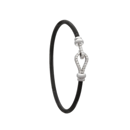 Pulsera de acero y oro de curva luminosa. El motivo alargado conserva un espacio interior abierto.