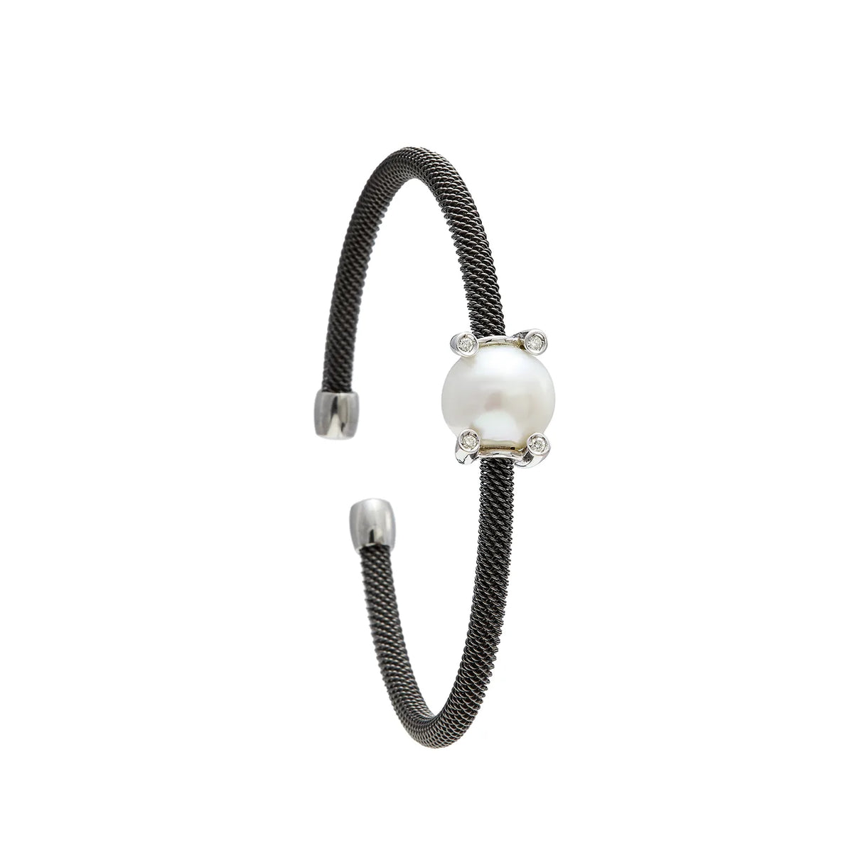 Pulsera de acero y detalle redondo claro. Los pequeños elementos plateados acompañan el centro por ambos lados.
