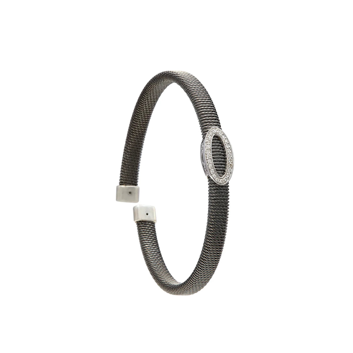 Pulsera de acero con óvalo calado. El motivo central conserva un espacio interior visible.