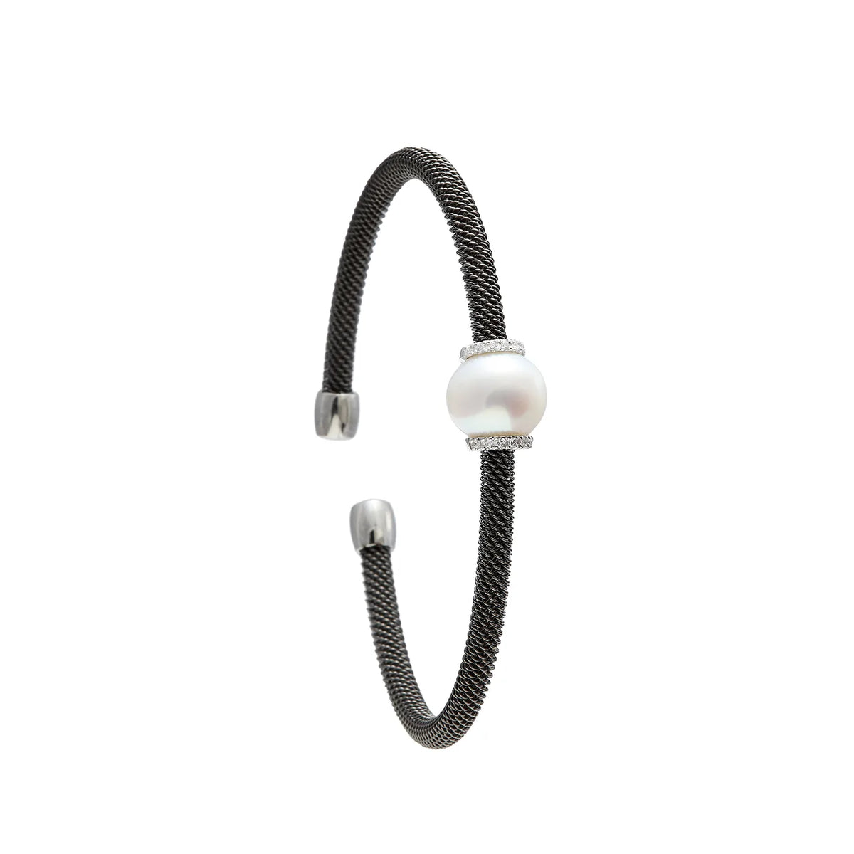 Pulsera de acero de contraste nacarado. Los bordes lisos plateados enmarcan el detalle redondo.