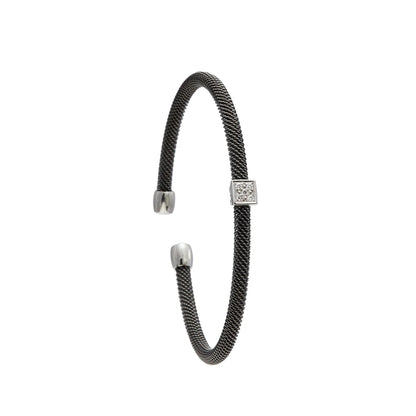 Pulsera de acero y cuadrado luminoso. Las piedras incoloras se agrupan dentro del motivo frontal.