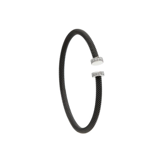 Pulsera de acero con extremos luminosos. Los remates presentan pequeños destellos de tono claro.